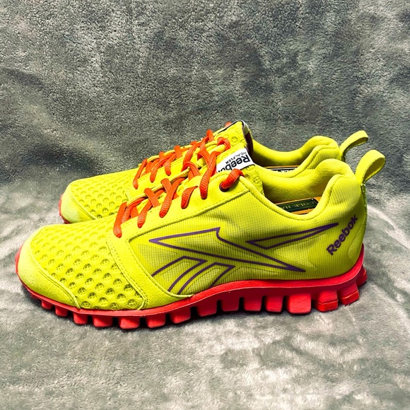 Reebok Shoes - Reebok RealFlex Women's Size 8 Neon Yellow and Pink V45700.
